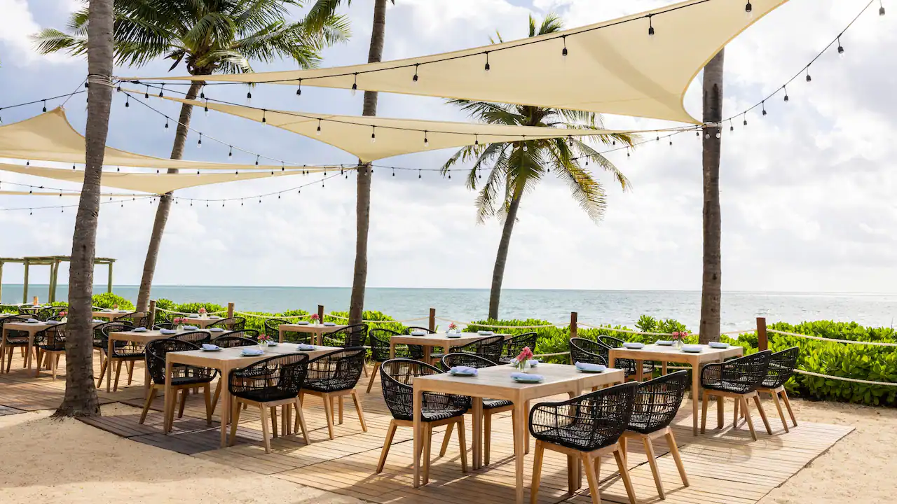 CANIA-P0048-Lola-Beach-Club-Outdoor-Dining-Club.16x9